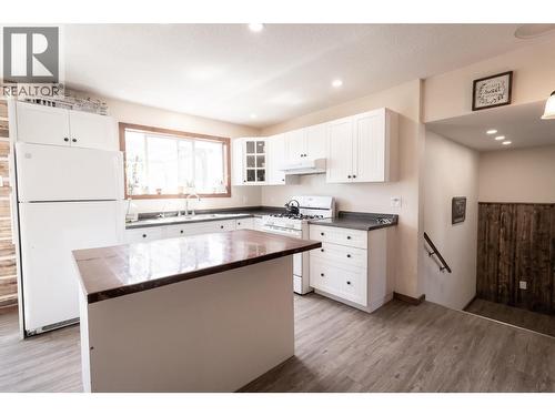 1016 240 Road, Fort St. John, BC - Indoor Photo Showing Kitchen With Double Sink