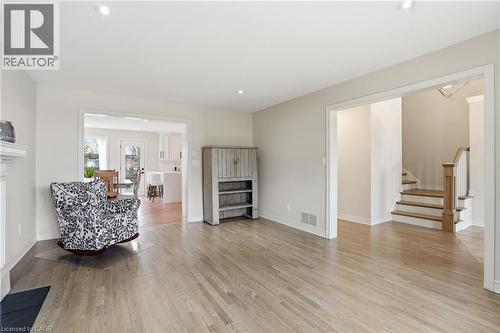 Sitting room featuring light wood-style floors and recessed lighting - 56 Mccaffery Crescent, St. Catharines, ON - Indoor Photo Showing Living Room With Fireplace