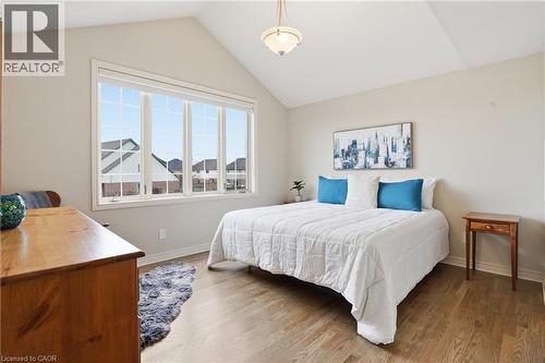 Bedroom featuring light wood-style floors and baseboards - 56 Mccaffery Crescent, St. Catharines, ON - Indoor Photo Showing Bedroom
