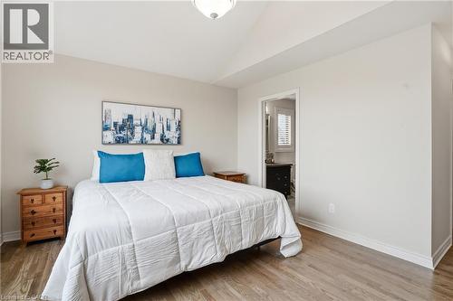 Bedroom with lofted ceiling and light wood-style flooring - 56 Mccaffery Crescent, St. Catharines, ON - Indoor Photo Showing Bedroom