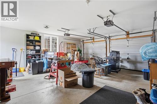 Garage with a garage door opener - 56 Mccaffery Crescent, St. Catharines, ON - Indoor Photo Showing Garage