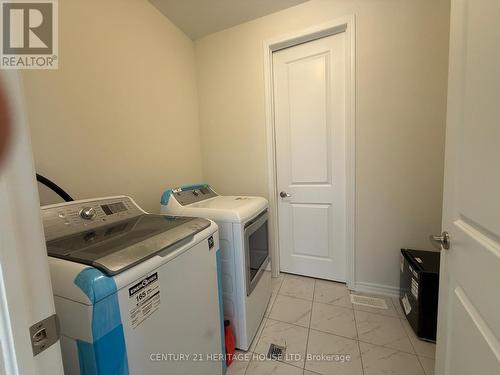 18 Dolucci Crescent E, Brampton, ON - Indoor Photo Showing Laundry Room