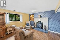 Lower level rec room with wood stove - 