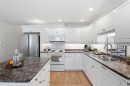 #101-193 Second Ave West, Qualicum Beach, BC  - Indoor Photo Showing Kitchen With Double Sink 
