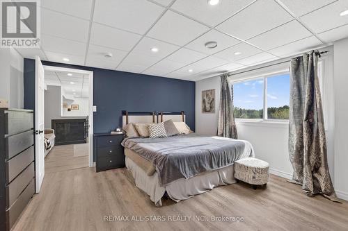 In-law suite Bedroom with walk-in closet - 10655 Sideroad 17, Brock, ON 