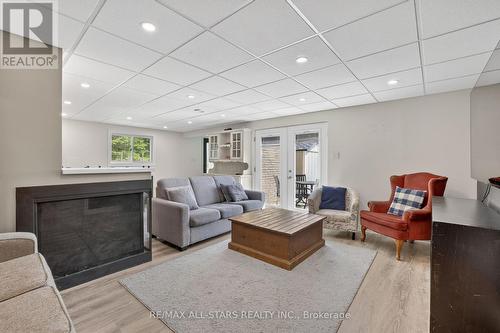 In-law suite w/3sided Fireplace & walkout to patio - 10655 Sideroad 17, Brock, ON 