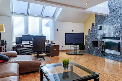 Salle familiale - 7935 Rue Rostand, Brossard, QC - Indoor With Fireplace