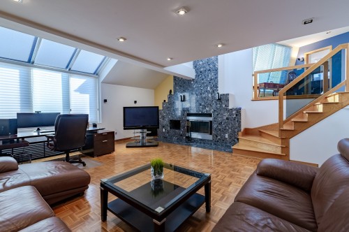 Salle familiale - 7935 Rue Rostand, Brossard, QC - Indoor Photo Showing Living Room With Fireplace