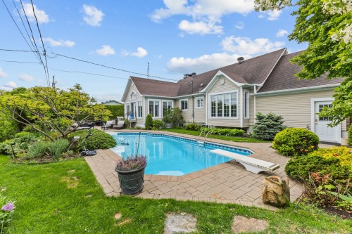 Courtyard - 496 Rue Fortin, Napierville, QC - Outdoor With In Ground Pool
