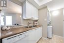 Kitchen (laundry at end) - 1206 - 5 Greystone Walk Drive, Toronto (Kennedy Park), ON  - Indoor 