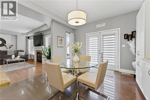 23 Kellogg Avenue, Hamilton, ON - Indoor Photo Showing Dining Room With Fireplace