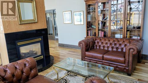 306 - 102 Bloor Street W, Toronto, ON - Indoor Photo Showing Living Room With Fireplace
