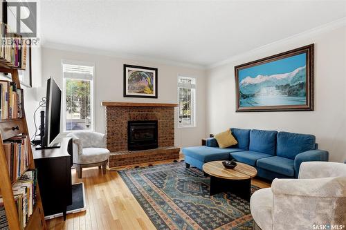 2231 Mcintyre Street, Regina, SK - Indoor Photo Showing Living Room With Fireplace