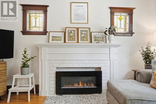 146 Park Row S, Hamilton, ON - Indoor Photo Showing Living Room With Fireplace