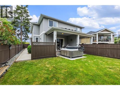 Manageable Irrigated Green Space - 827 Juniper Road, Kelowna, BC - Outdoor With Deck Patio Veranda