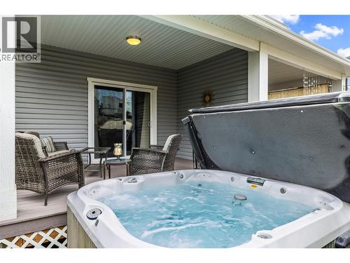 Hot Tub and Cover for Ultimate Relaxation - 827 Juniper Road, Kelowna, BC - Outdoor With Deck Patio Veranda