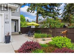 Private Entry - Flanked by Gardens Plots, Flagstone Patio and Concrete Walkways - 