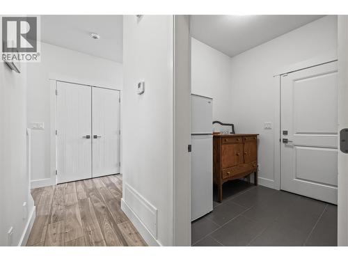 Main Floor - Mud Room access to Garage - 827 Juniper Road, Kelowna, BC - Indoor Photo Showing Other Room