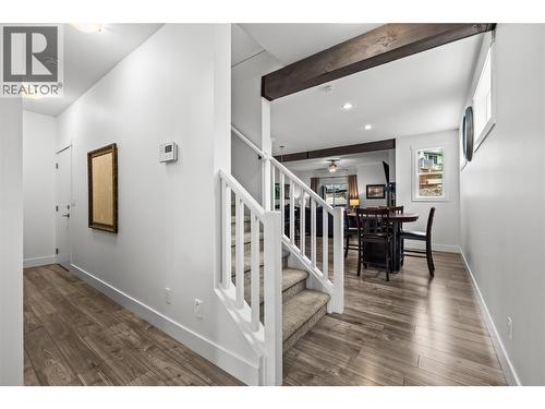Stairs to Basement at end of Hall. Stairs to Upper Level - 827 Juniper Road, Kelowna, BC - Indoor Photo Showing Other Room