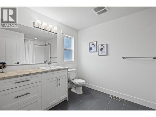 Primary - Sleek White Oversized Ensuite - 827 Juniper Road, Kelowna, BC - Indoor Photo Showing Bathroom