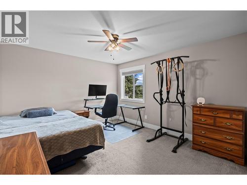 Large Bedroom with Large Closet - 827 Juniper Road, Kelowna, BC - Indoor Photo Showing Bedroom