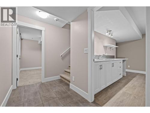 Finished Basement Landing to Bedroom - 827 Juniper Road, Kelowna, BC - Indoor