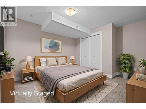Virtually Staged - Large Bedroom with Closet - 827 Juniper Road, Kelowna, BC - Indoor Photo Showing Bedroom