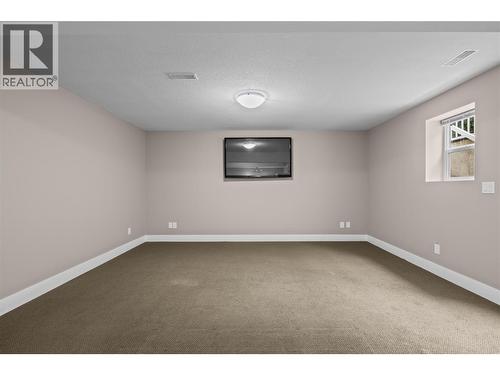 Great Room Entertaining Space - 827 Juniper Road, Kelowna, BC - Indoor Photo Showing Other Room