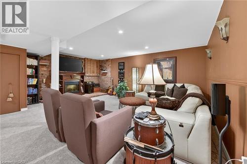 7 Coral Drive, St. Catharines, ON - Indoor Photo Showing Living Room With Fireplace