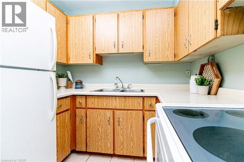 23 Main Street Unit# 405, Dundas, ON - Indoor Photo Showing Kitchen With Double Sink