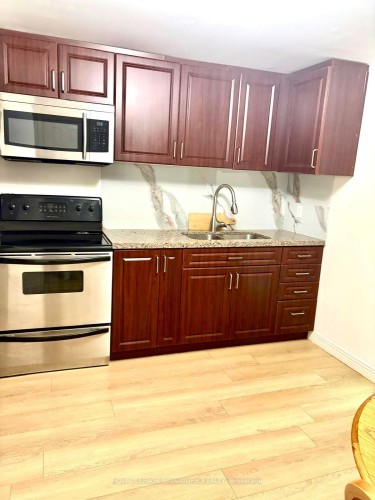 27 Dalbret Crescent, Toronto, ON - Indoor Photo Showing Kitchen With Double Sink