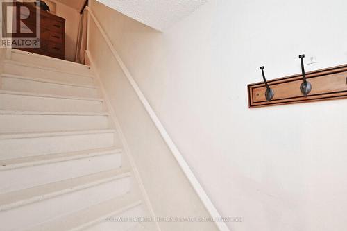 wide stairs lead to second floor - 20805 Brock Road, Brock, ON - Indoor Photo Showing Bedroom