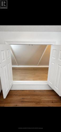 finished - well lit storage - 20805 Brock Road, Brock, ON - Indoor Photo Showing Bedroom