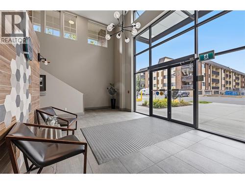 Welcoming entryway showcasing modern design and thoughtful functionality. - 1775 Chapman Place Unit# 101, Kelowna, BC - Indoor Photo Showing Other Room