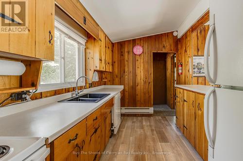 8 Nassau Court, Tiny, ON - Indoor Photo Showing Kitchen With Double Sink