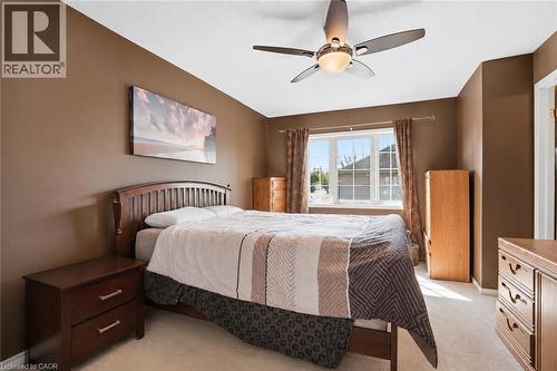 Virtually Staged - 565 Rymal Road E Unit# 2, Hamilton, ON - Indoor Photo Showing Bedroom