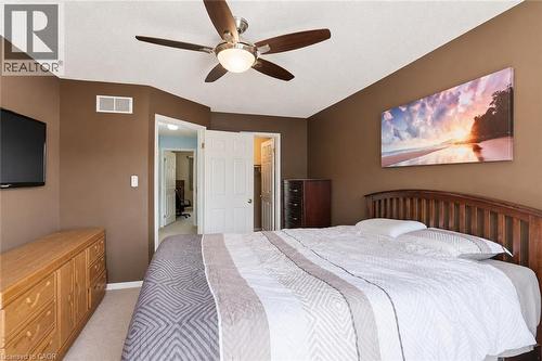 Virtually Staged - 565 Rymal Road E Unit# 2, Hamilton, ON - Indoor Photo Showing Bedroom