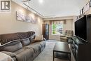 Virtually Staged - 565 Rymal Road E Unit# 2, Hamilton, ON  - Indoor Photo Showing Living Room 