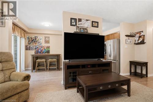 Virtually Staged - 565 Rymal Road E Unit# 2, Hamilton, ON - Indoor Photo Showing Living Room