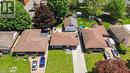 Single-story home featuring a brown shingle roof, light-colored siding, and a paved driveway - 158 Plymouth Road, Kitchener, ON  - Outdoor 