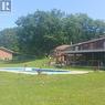 10 Edgewater Road, Wasaga Beach, ON  - Outdoor With In Ground Pool With Deck Patio Veranda With Backyard 