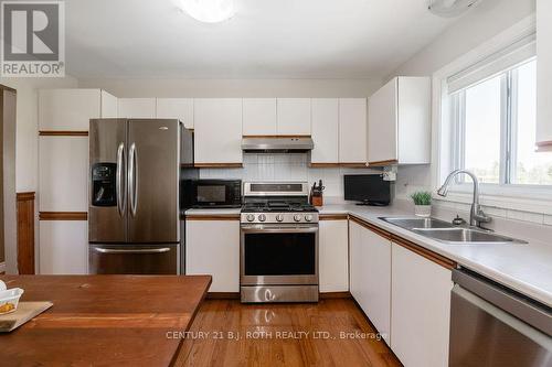 2823 Small Street, Innisfil, ON - Indoor Photo Showing Kitchen With Double Sink
