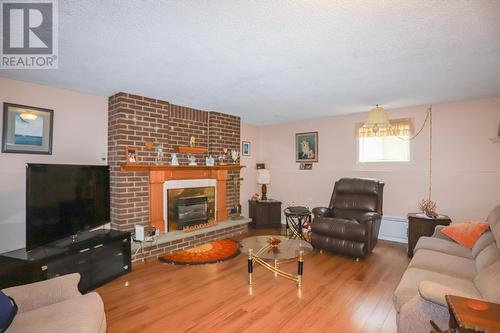 34 Taskar Dr, Sault Ste. Marie, ON - Indoor Photo Showing Living Room With Fireplace