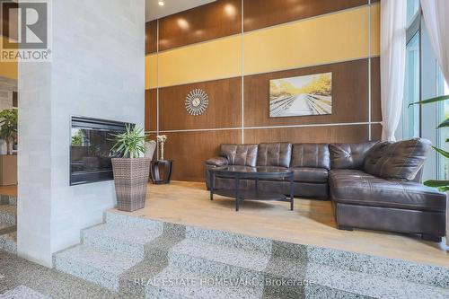 805 - 88 Grangeway Avenue, Toronto, ON - Indoor Photo Showing Living Room With Fireplace