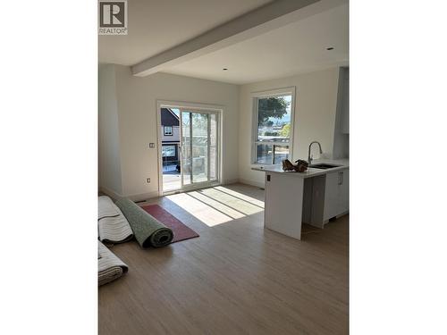 Main floor kitchen and Dining - 980 Franklyn Road Unit# 3 Lot# 3, Kelowna, BC 