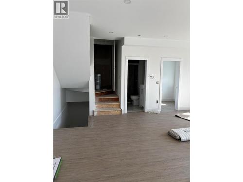 Laundry on left 2 piece bathroom in middle and office/computer room on the right - 980 Franklyn Road Unit# 3 Lot# 3, Kelowna, BC 