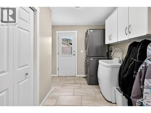 Laundry and entrance to both the garage and back yard - 6451 Beaver Crescent, Kamloops, BC 