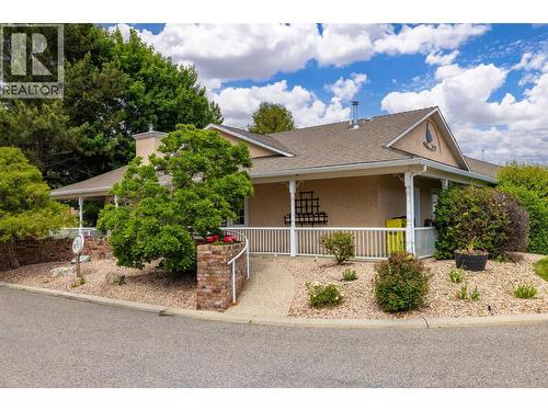 Residents have access to a clubhouse, fitness facilities, library, and social gathering spaces. - 2250 Louie Drive Unit# 69, Westbank, BC - Outdoor With Deck Patio Veranda