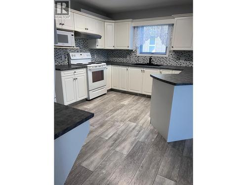 Home is now vacant! - 2250 Louie Drive Unit# 69, Westbank, BC - Indoor Photo Showing Kitchen