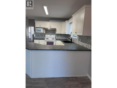 Home is now vacant! - 2250 Louie Drive Unit# 69, Westbank, BC - Indoor Photo Showing Kitchen